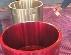 Mitigating Catastrophic Main Shaft Failure: Dye Penetrant Inspection Protocols for Cast Copper Crusher Bushings